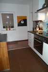 Lünen: Küchenboden mit Steinteppich in RAL 8011 nußbraun
